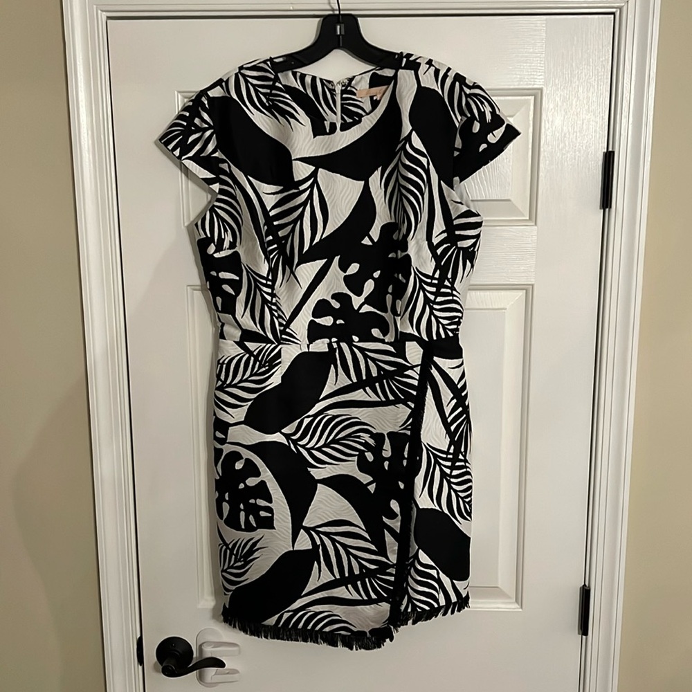 Hutch tropical mini faux wrap fringe dress.